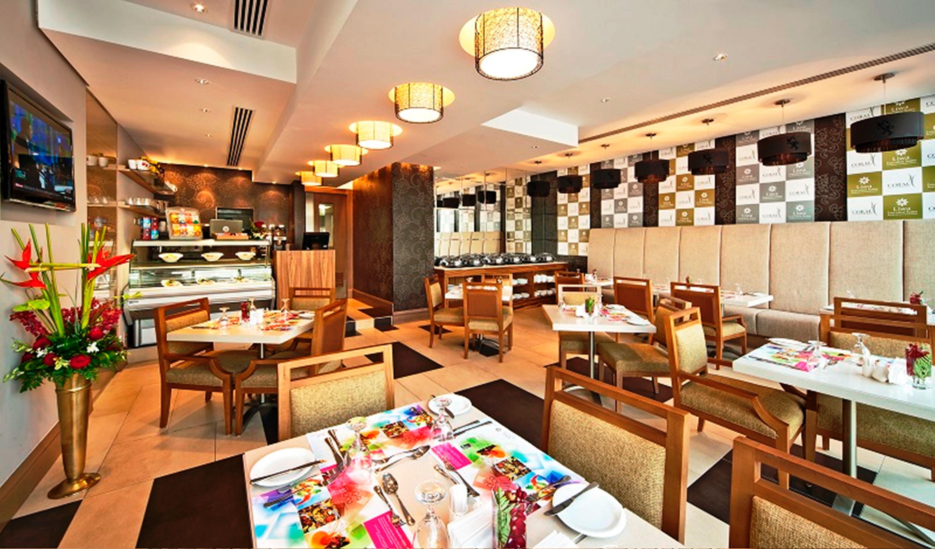 Oaks Liwa Executive Suites Abu Dhabi Restaurante foto